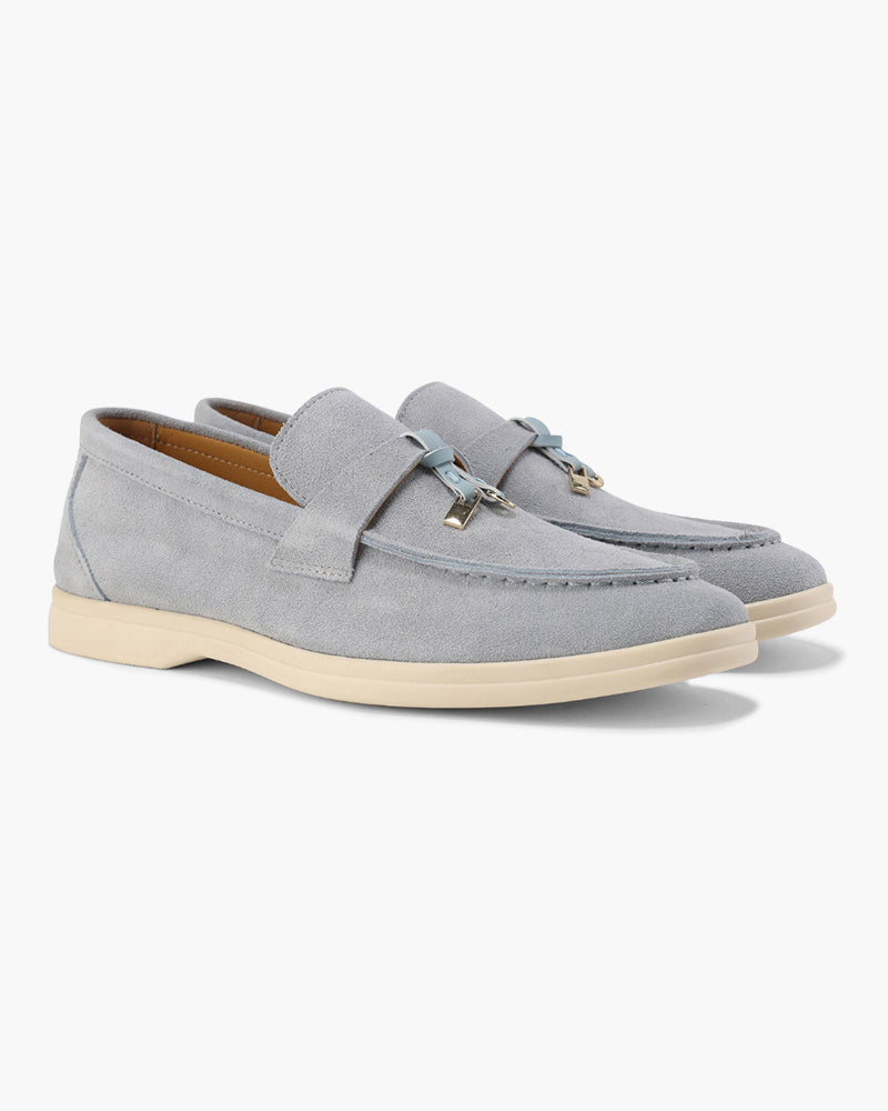 Women's slip-on loafers with penny straps and metal trim