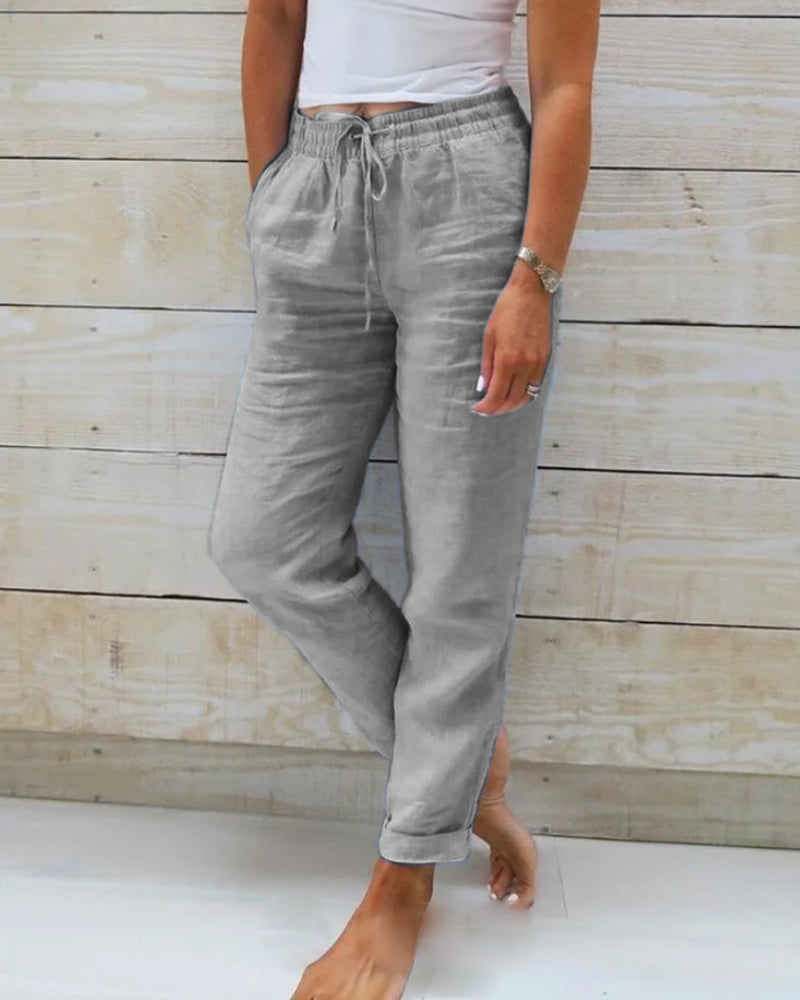 Women's tapered trousers with elastic drawstring waist and side pockets