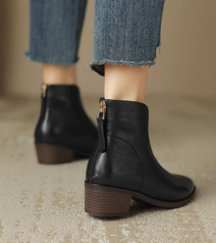Women's pointed toe ankle boots with angled topline and block heel