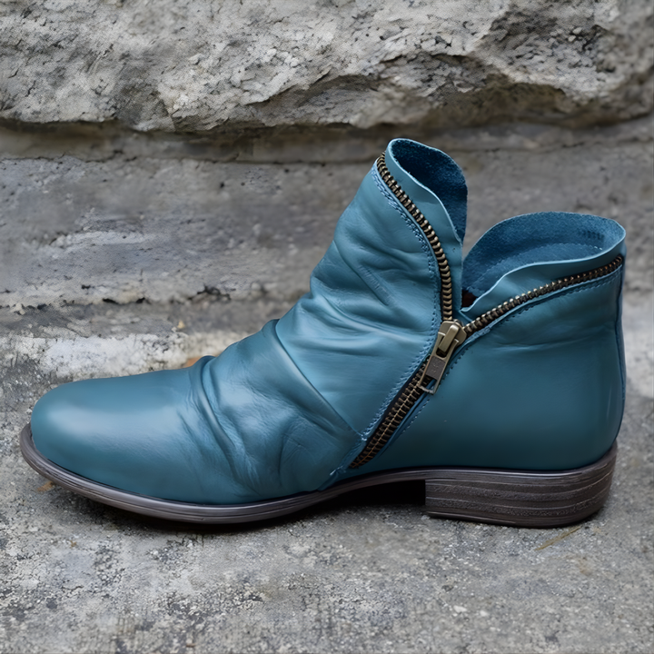 Women's ankle boots with ruched upper, side zipper and low heel