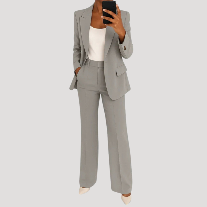 Women's tailored two-piece suit with notched blazer and straight-leg trousers