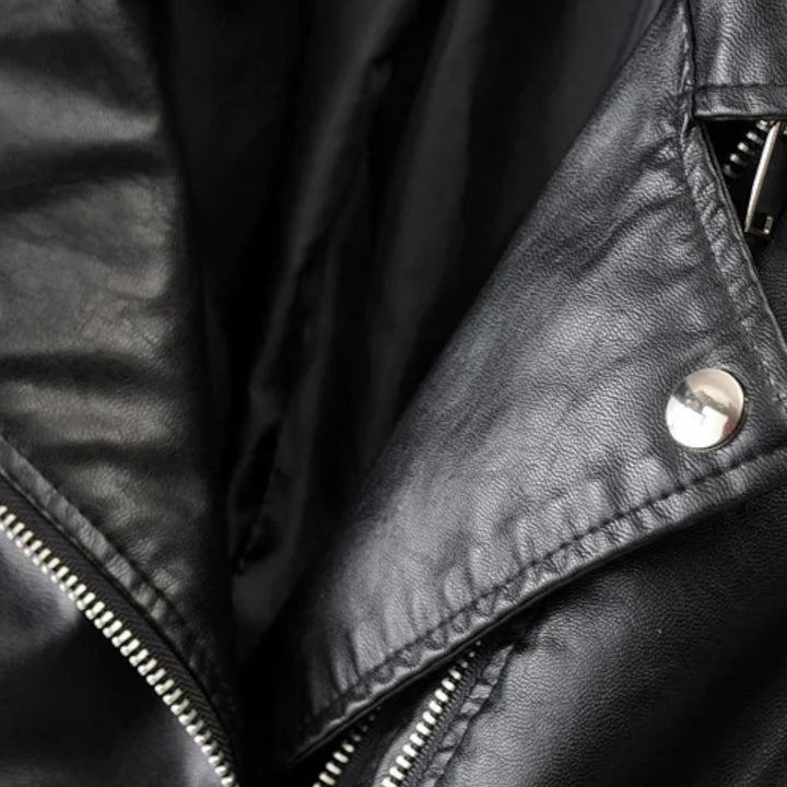 Women's black cropped biker jacket with asymmetric zipper and quilted sleeves