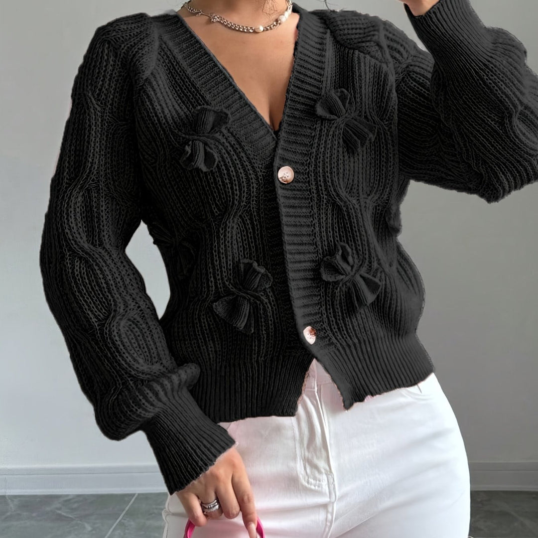 Women's ribbed knit cardigan with bow details, V-neckline and long sleeves