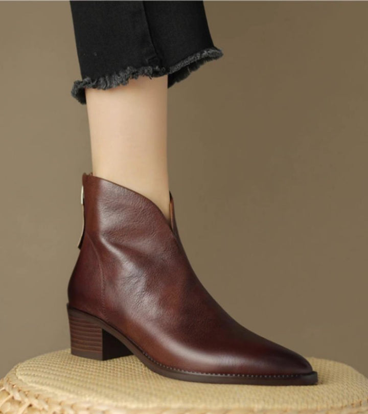Women's pointed toe ankle boots with angled topline and block heel
