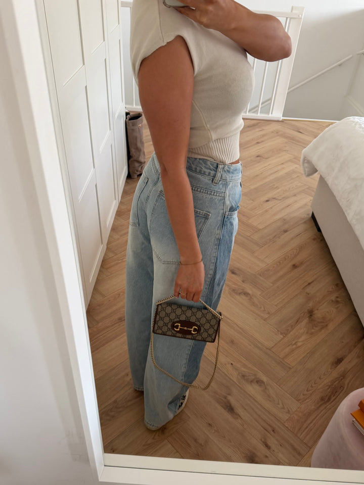 Women's light blue high-rise wide leg jeans with darker outer-leg panels