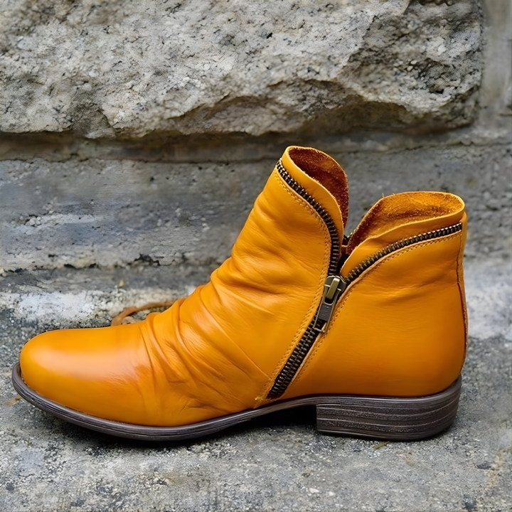Women's ankle boots with ruched upper, side zipper and low heel