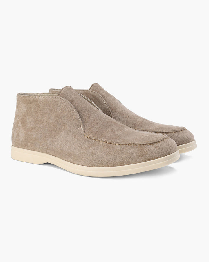 High-top slip-on loafers with rounded moc toes and flat light-coloured soles