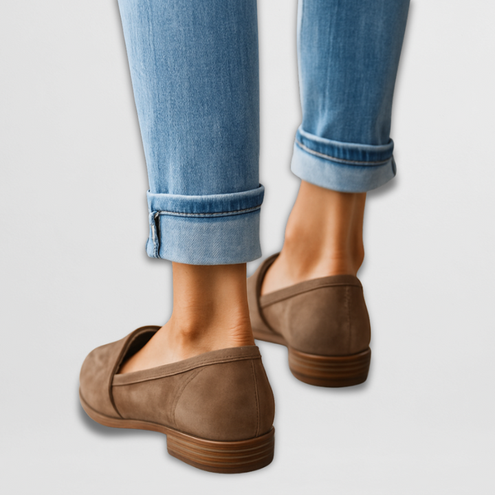 Women's pointed toe loafers with penny strap detail and flat soles