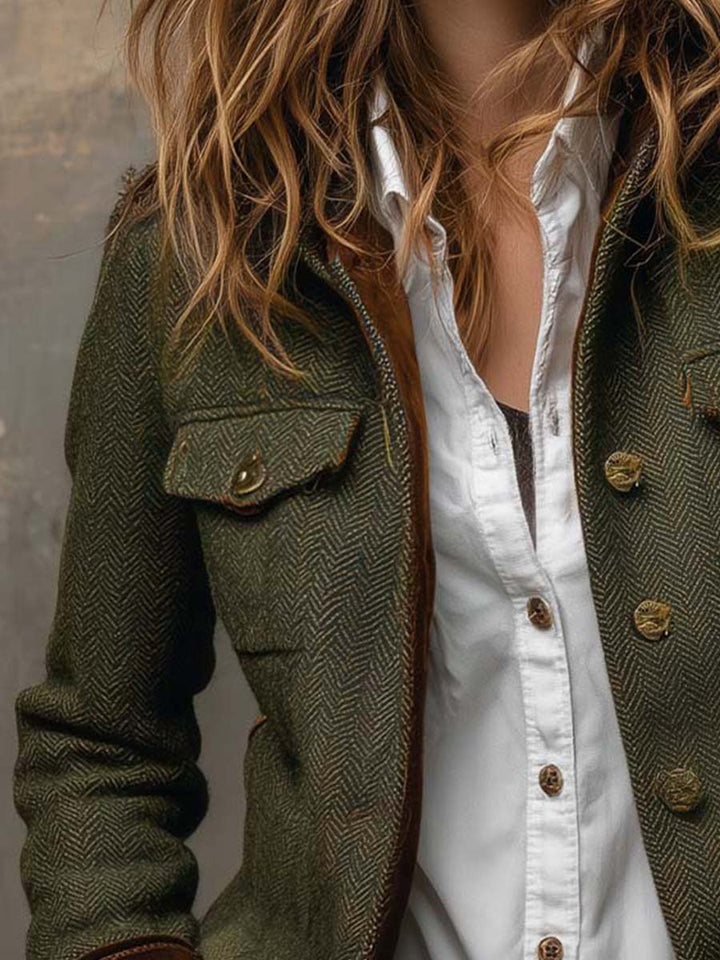 Women's green herringbone blazer with brown contrast trim and button front