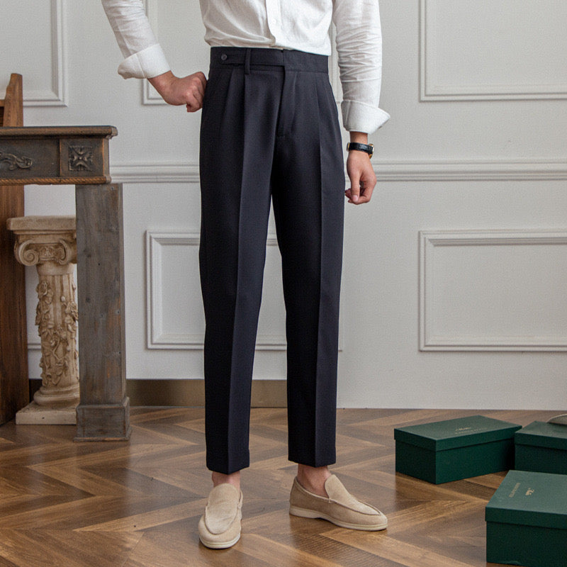 Women's high-rise pleated straight-leg trousers with belt loops and side pockets