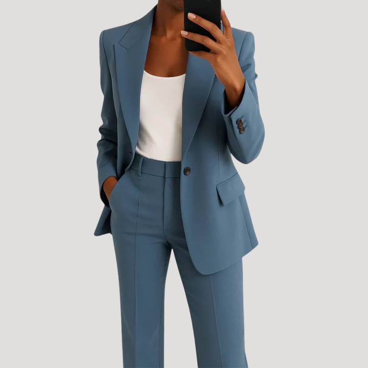 Women's tailored two-piece suit with notched blazer and straight-leg trousers