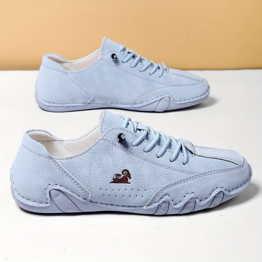 Women's low-top lace-up sneakers with round toes and segmented soles