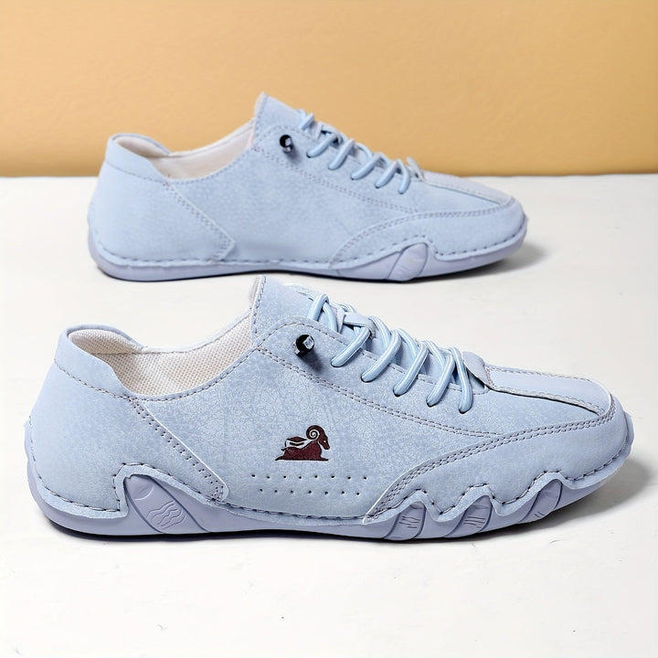 Women's low-top lace-up sneakers with round toes and segmented soles