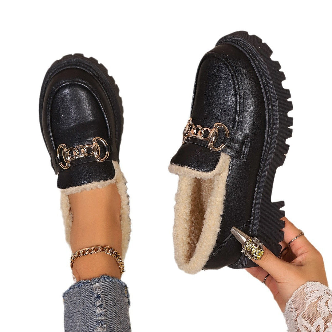 Women's plush lined loafers with decorative upper detail and chunky lug soles