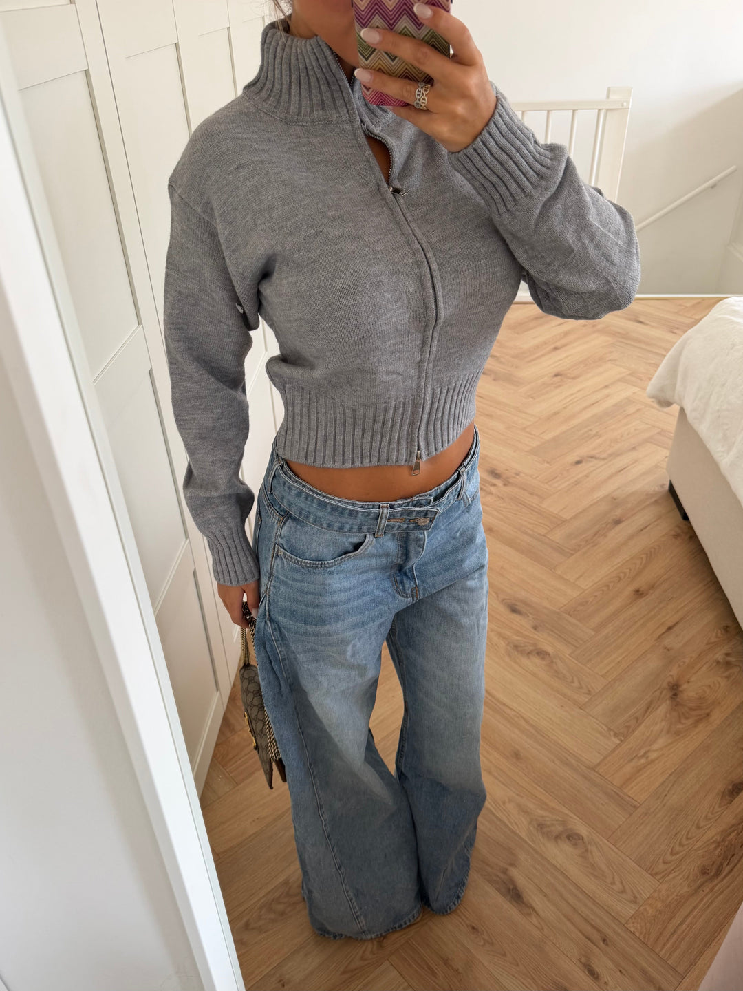 Women's light blue high-rise wide leg jeans with button fastening and five pockets