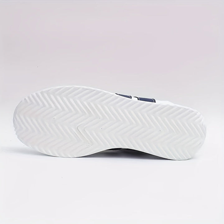 White women's lace-up sneakers with navy side stripes and round toes