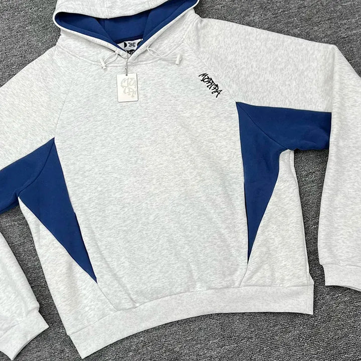 Color block hoodie in gray and blue with a hood and long sleeves
