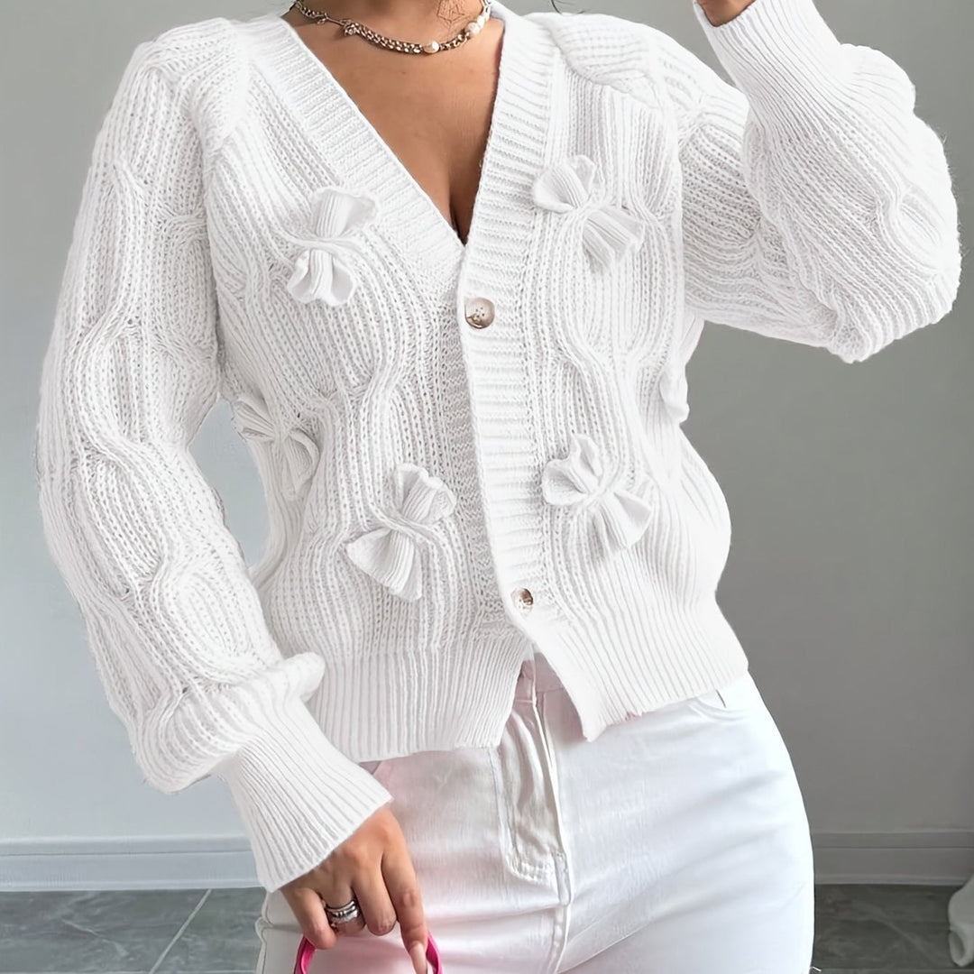 Women's ribbed knit cardigan with bow details, V-neckline and long sleeves