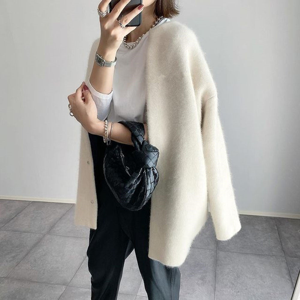 Women's long knitted cardigan with round neck and button front