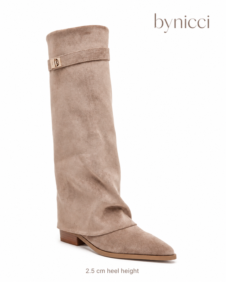 Women's beige knee-high boots with pointed toes, buckle straps and low block heels