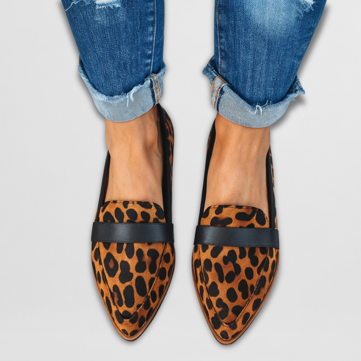 Women's pointed toe loafers with penny strap detail and flat soles