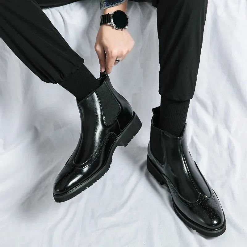 Chelsea boots with brogue detailing, elastic side panels and lug soles