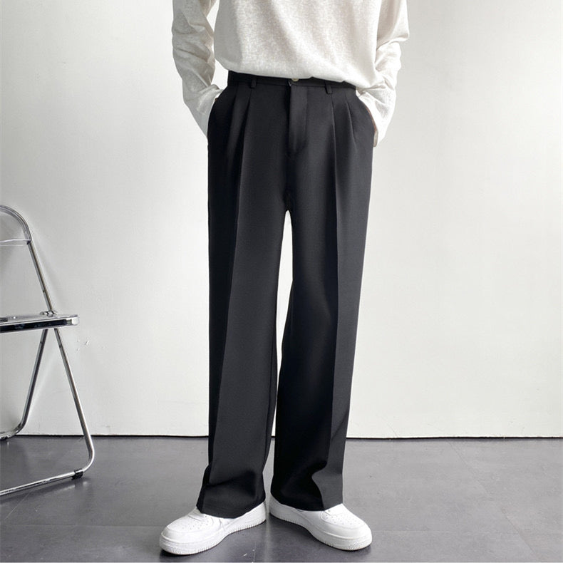 Women's high-rise pleated straight-leg trousers with belt loops and full-length hems