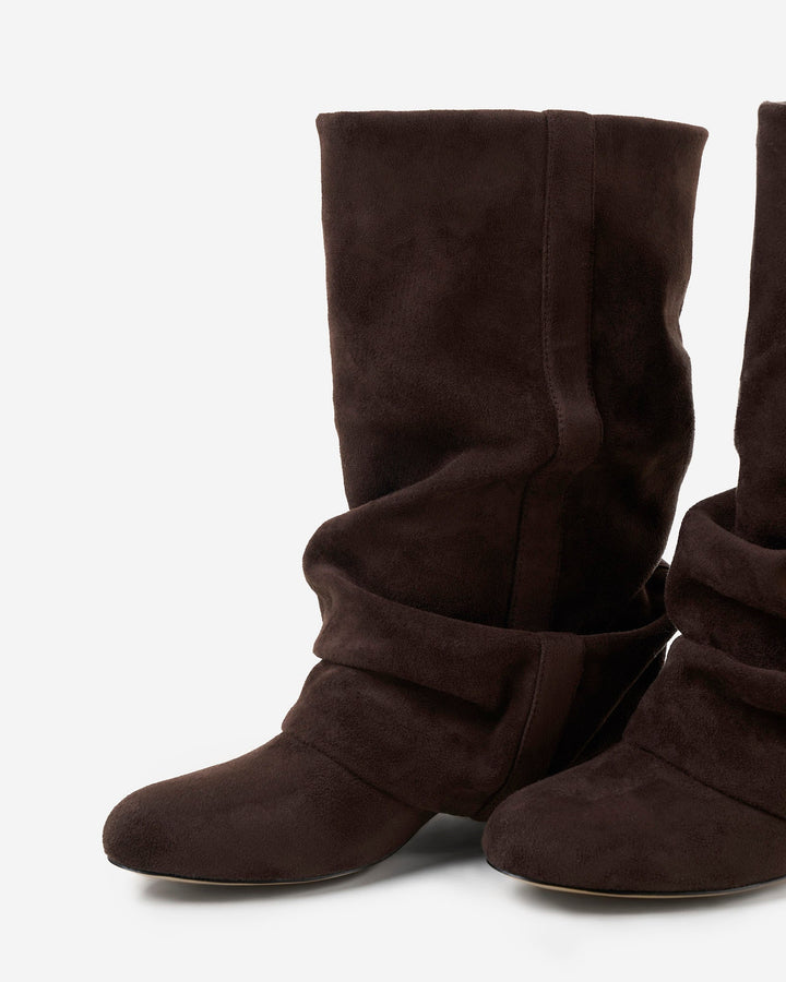 Women's dark brown slouchy knee-high boots with pointed toes and low heels