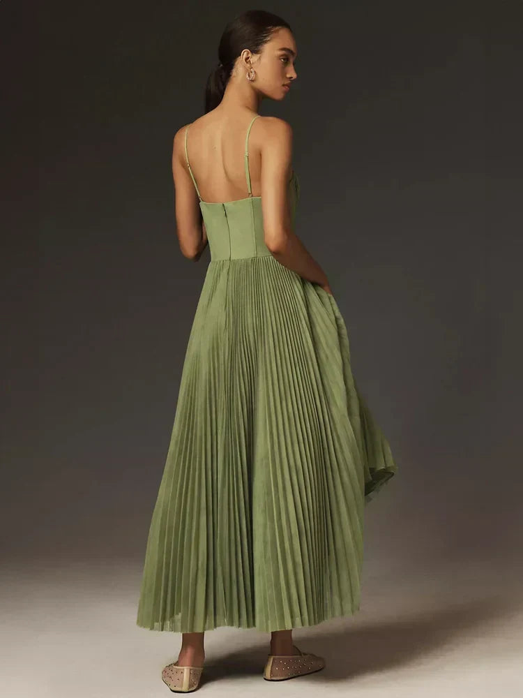 Women's olive green pleated midi dress with fitted corset bodice and spaghetti straps
