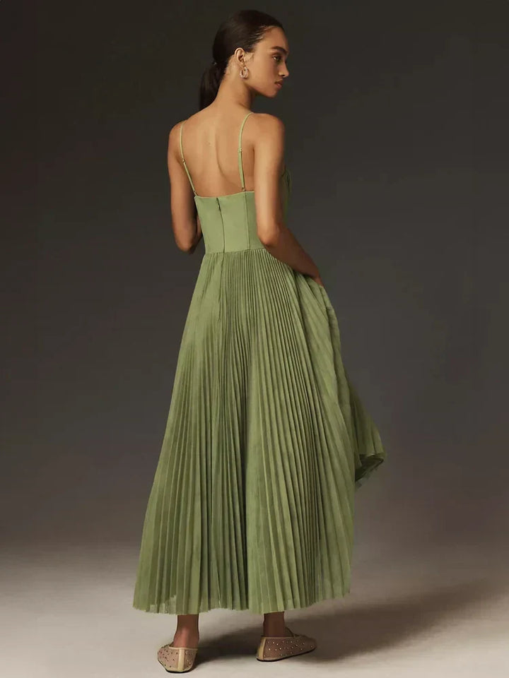 Women's olive green pleated midi dress with fitted corset bodice and spaghetti straps