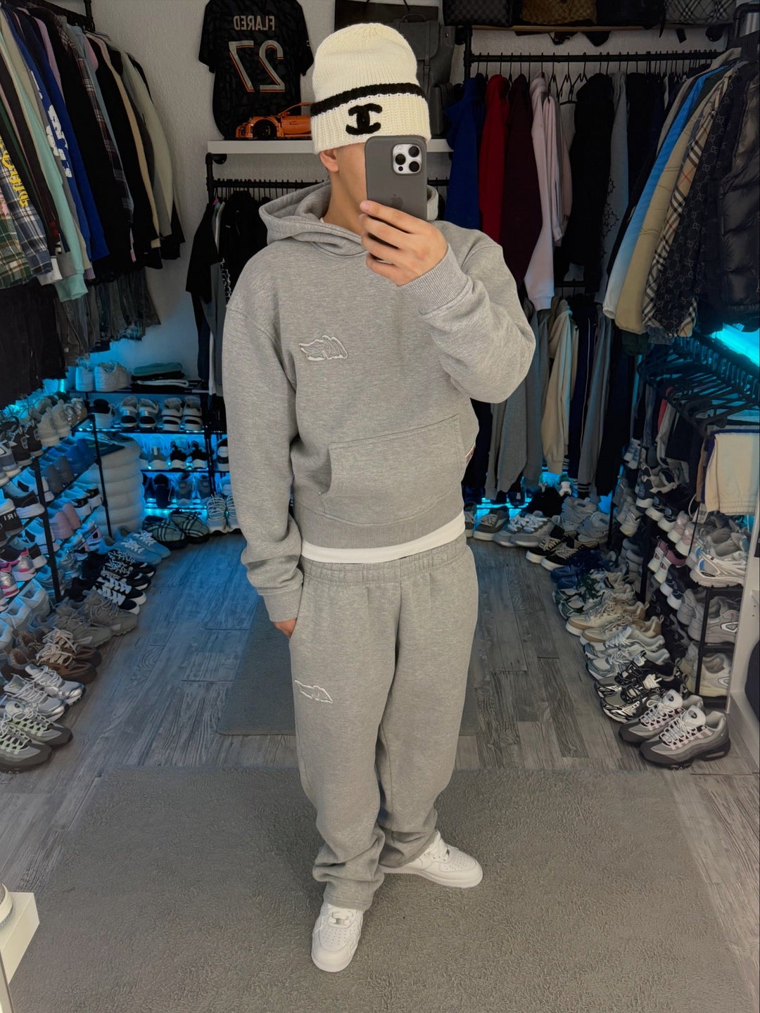 Gray unisex hooded sweatshirt with long sleeves and kangaroo pocket