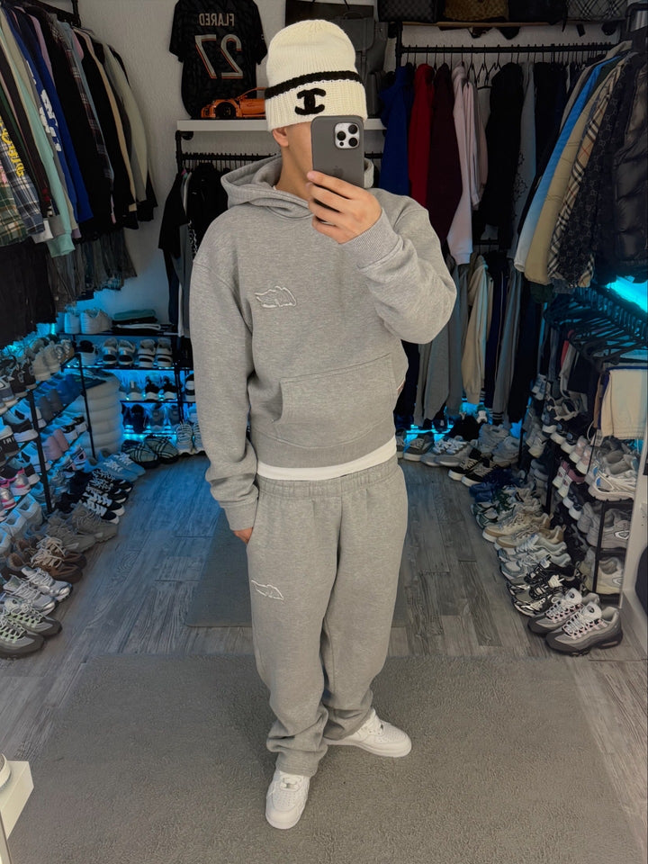 Gray unisex hooded sweatshirt with long sleeves and kangaroo pocket