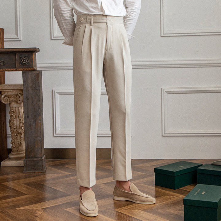 Women's high-rise pleated straight-leg trousers with belt loops and side pockets