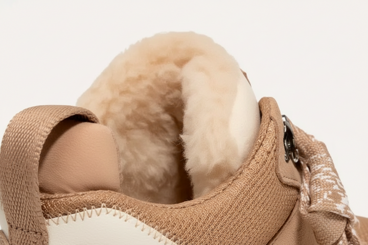 Women's beige high-top sneakers with patterned laces and platform soles