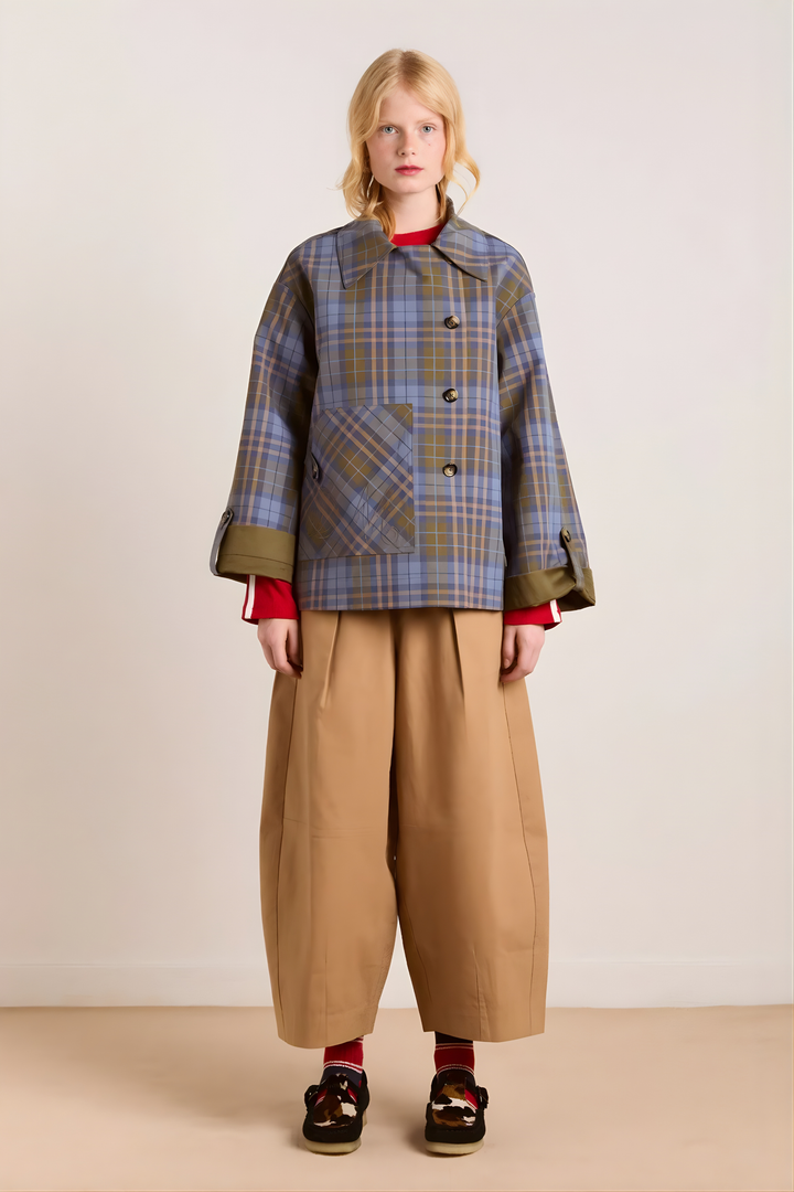 Women's brown jacket with blue plaid trim, raised collar and button front