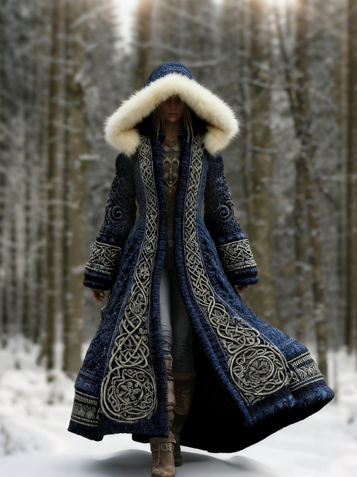 Women's hooded longline coat with ornate embroidery and pale hood trim