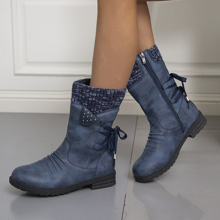 Women's winter boots with knitted cuffs, side zippers and lace-up details