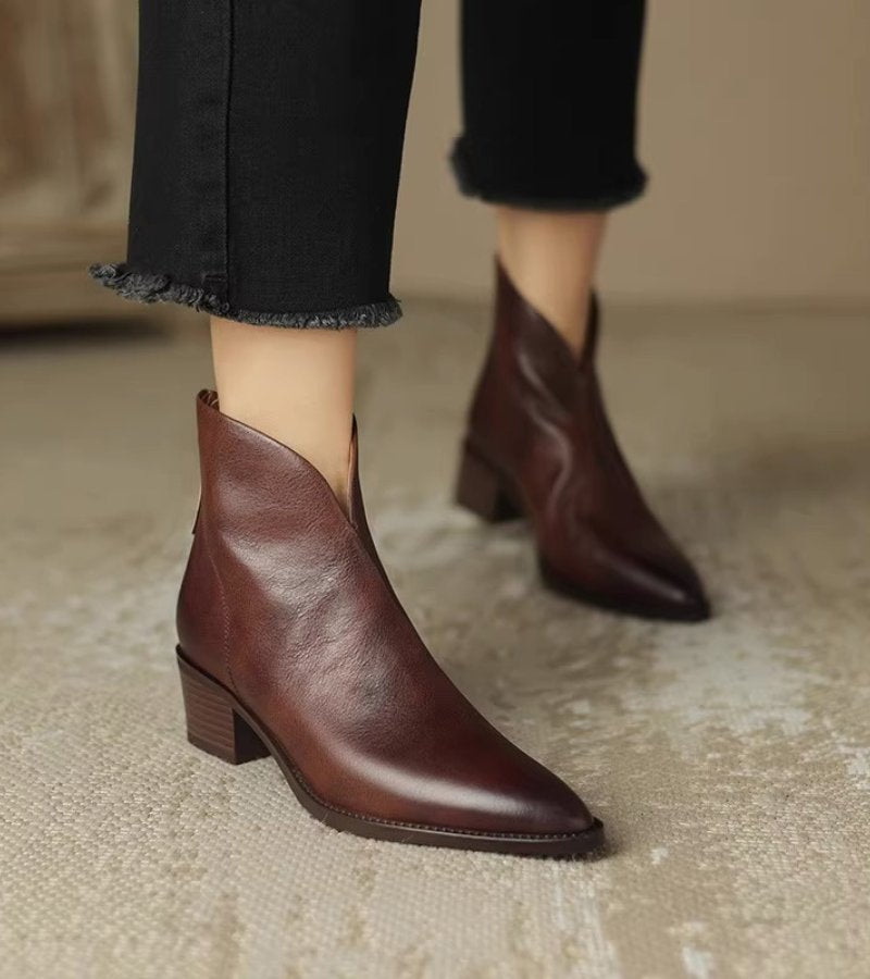 Women's pointed toe ankle boots with angled topline and block heel