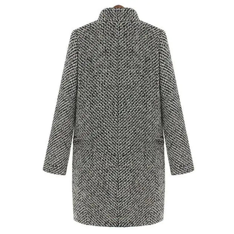 Women's long black and white houndstooth coat with lapels and button front