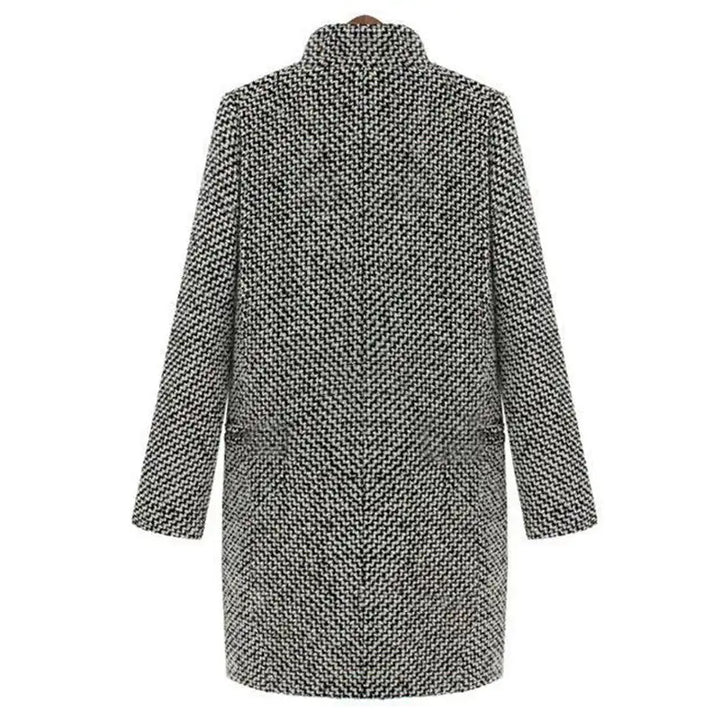 Women's long black and white houndstooth coat with lapels and button front