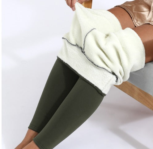 Women's high-rise fleece-lined leggings shown with plush lining and ankle-length legs