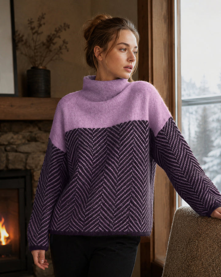 Women's high-neck sweater with contrasting chevron pattern and long sleeves