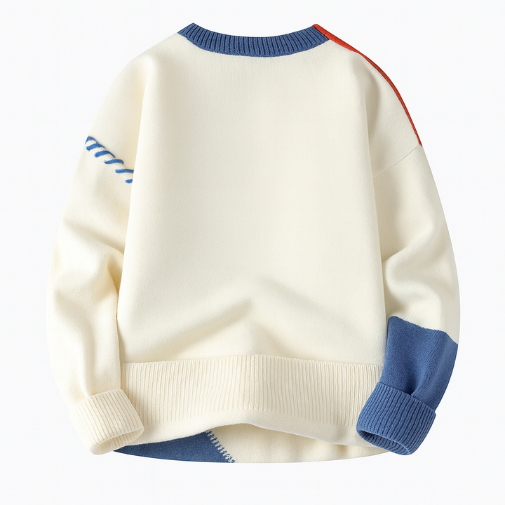 Women's patchwork cable knit sweater with crew neck and contrasting stitched panels