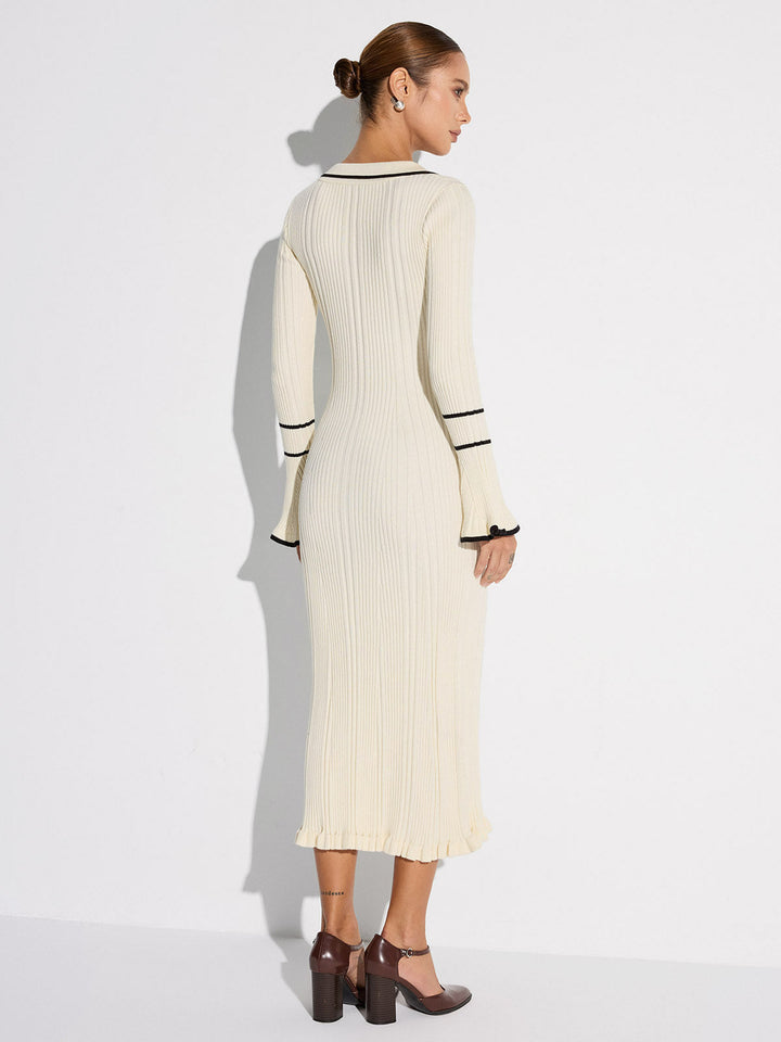 Women's off white ribbed midi sweater dress with black contrast trim, collar, buttons and long sleeves
