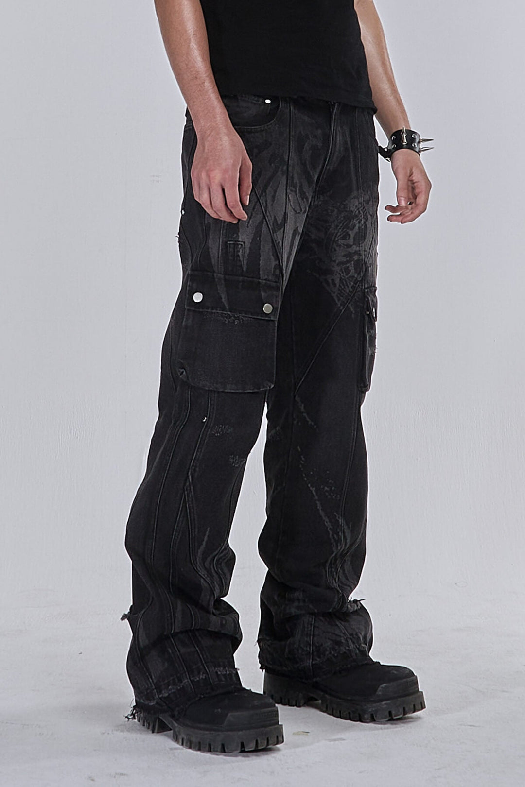Black wide-leg graphic cargo jeans with multiple utility pockets