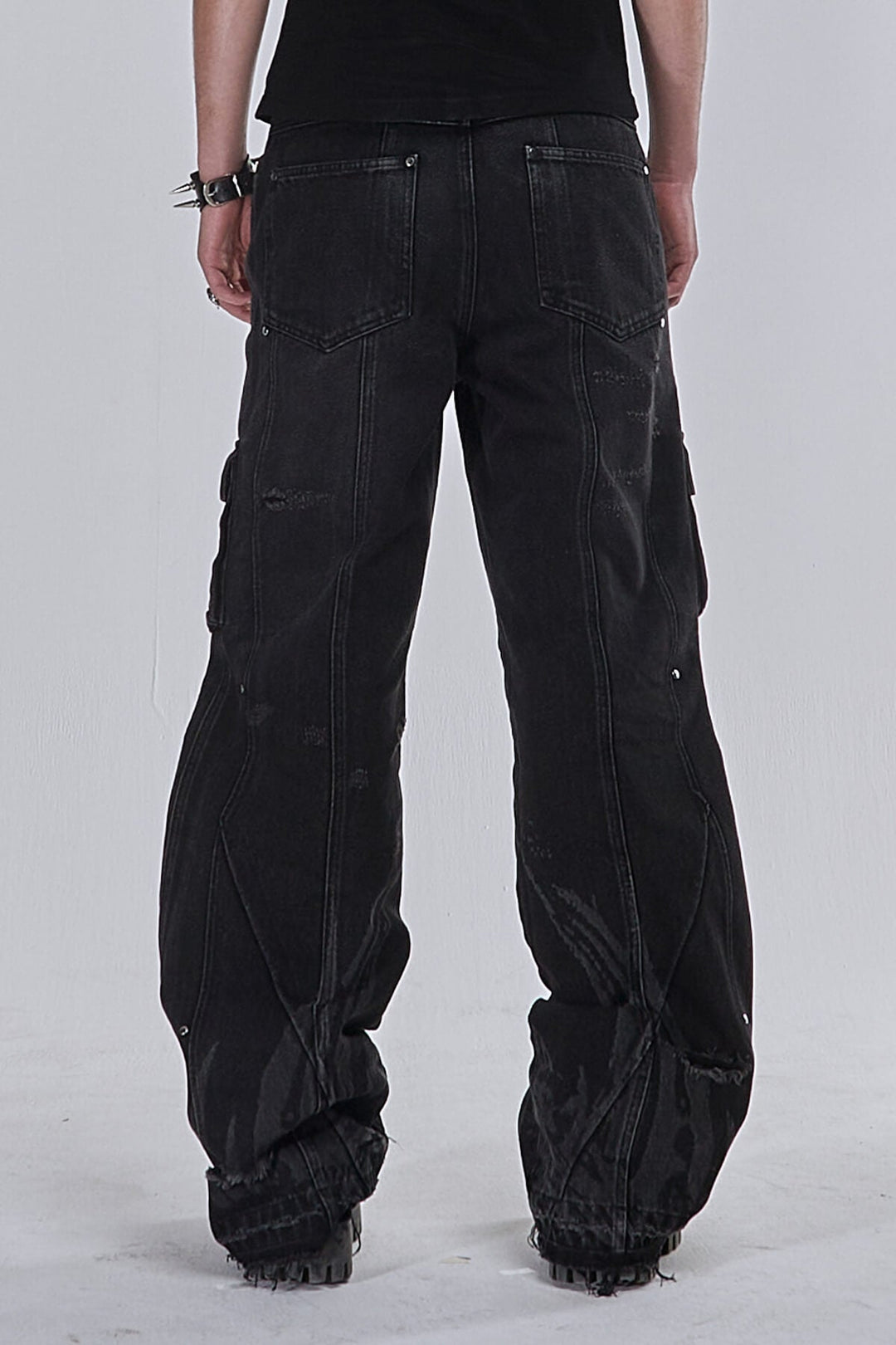 Black wide-leg graphic cargo jeans with multiple utility pockets
