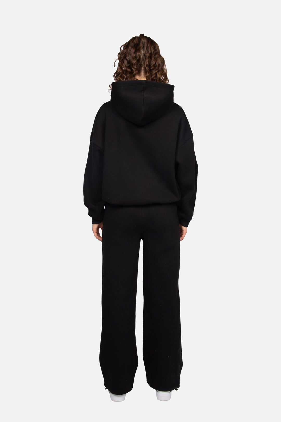 Women's black hooded sweatshirt with pink logo and ribbed trims