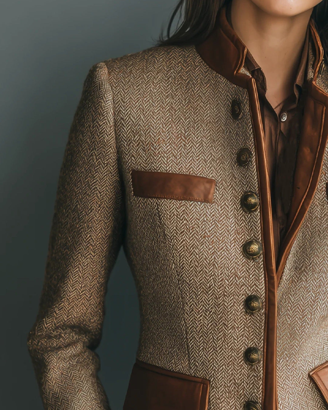 Women's brown herringbone coat with contrast trim, buttons and patch pockets