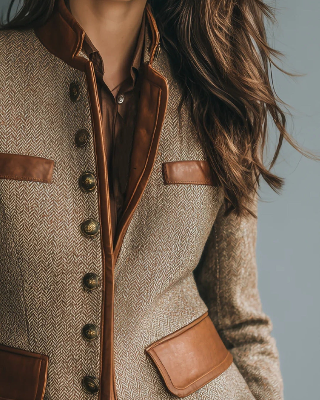 Women's brown herringbone coat with contrast trim, buttons and patch pockets