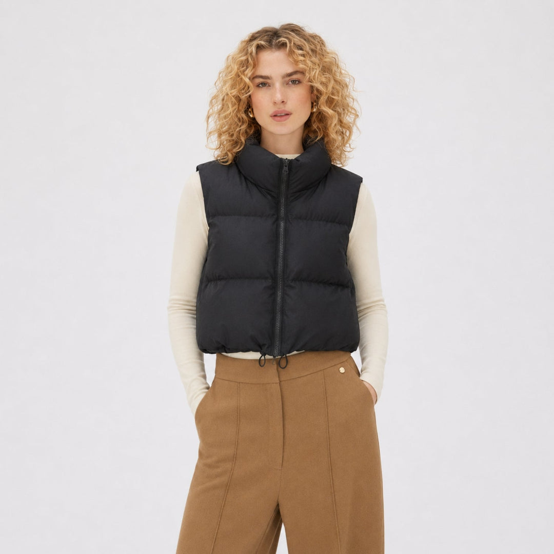 Women's cropped quilted puffer vest with mock neck and zip front